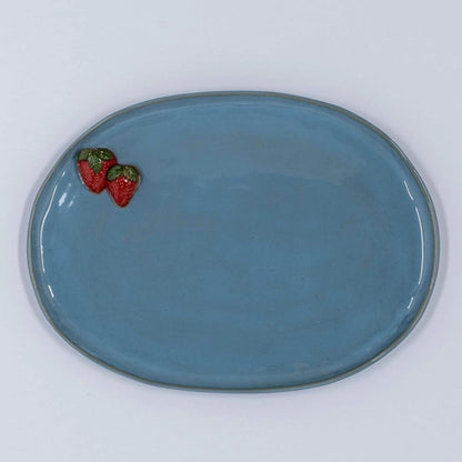 Sousplat Morango oval em cerâmica na cor azul